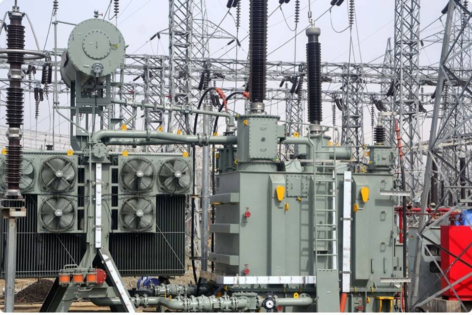 Indo Tech high-voltage oil-cooled power transformer installed in a live substation
