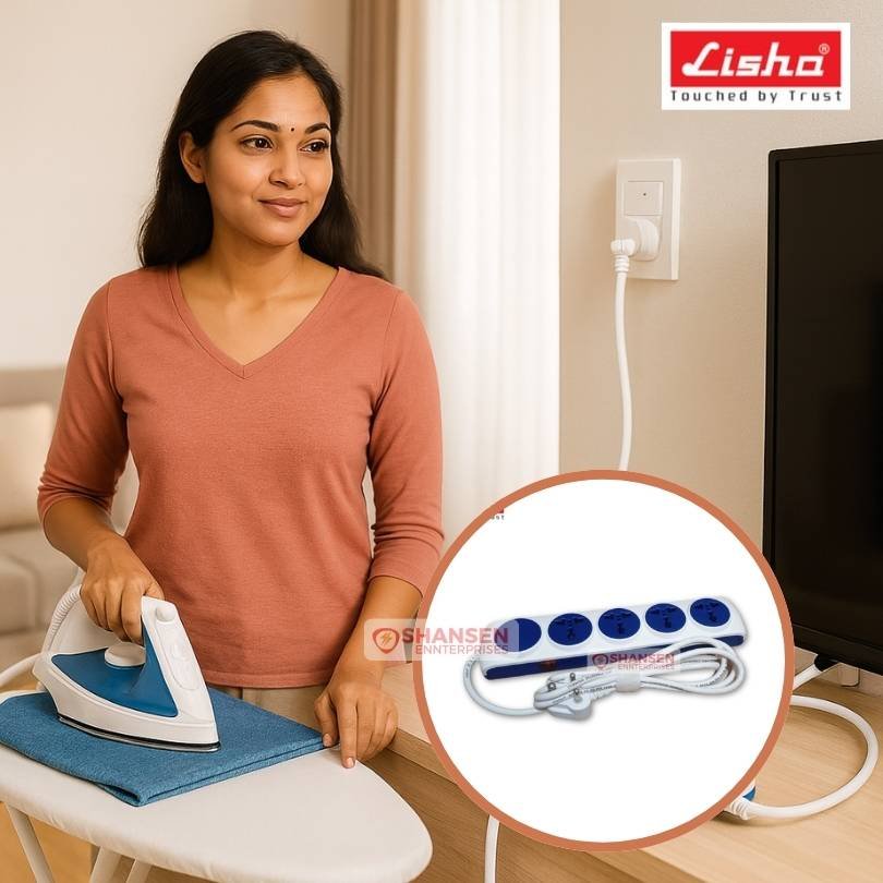 Indian woman ironing in a modern home beside a Lisha FUTURA 6A power strip with white cable, 4 international sockets and power indicator